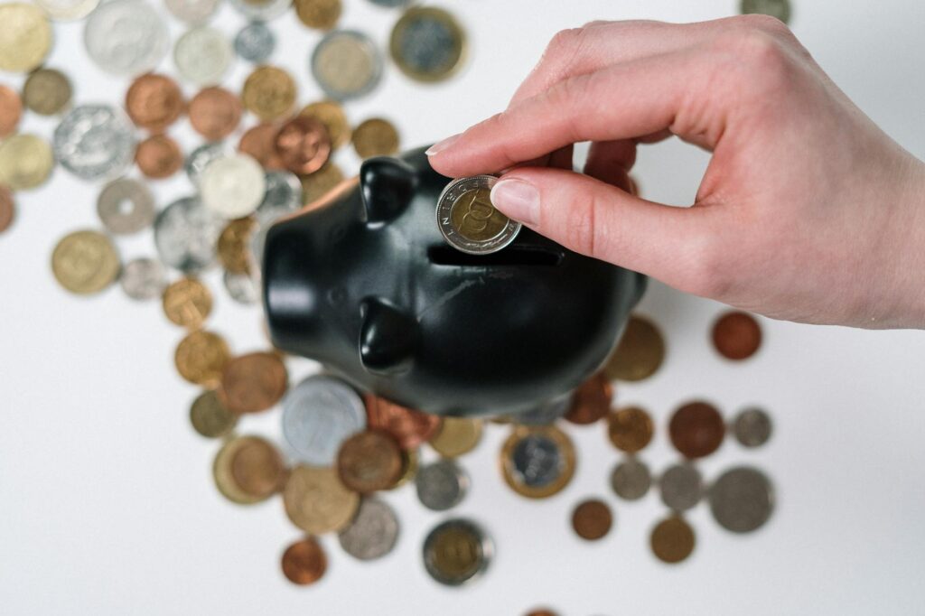 An overflowing piggy bank symbolizing the successful accumulation of funds for a study abroad program.
