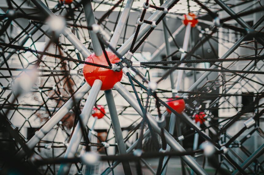 Abstract representation of interconnected glowing dots, symbolizing the importance of college community support for student success.