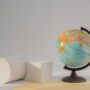 Abstract world map representing the global opportunities available through strategic study abroad savings.